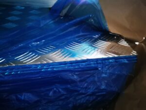 ALUMINUM CHEQUERED SHEET WITH BLUE FILM 